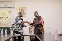 Mr. Hayford Siaw with Mr. Rene Gameli-Kwame after signing the deal