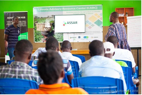 Prince Ansah, a technical officer introducing farmers to Climate Advisory Center