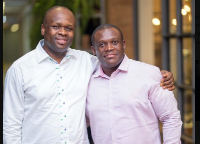 The late Edward Omane Boamah and Same Geroge (R)