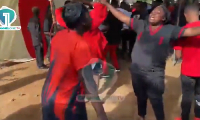 Sympathisers were seen in tears at the funeral