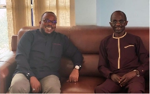 Chairman of the Council of Elders of the NDC in South Africa Benjamin Kofi Quashie (left)