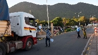 Police officers releasing trucks at the Namanga Border Point between Kenya and Tanzania