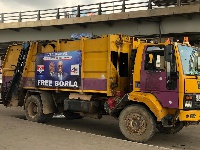 A photo of the waste collection truck positioned at the Kwame Nkrumah Circle