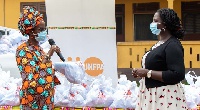 Deputy UNFPA rep, Agnes Ntibanyuruwa presenting the items