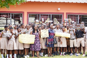 Eleanor Effe Amanor in a photo with some studens