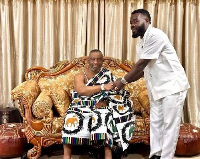 Richard Nii Armah Quaye shaking hands with the Ga Mantse