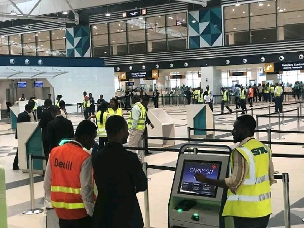 Travellers and workers at the Terminal 3 of Kotoka International Airport