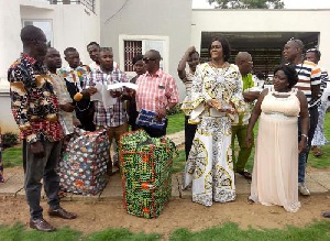 Lawyer Barbara Oteng Gyasi (2nd right) donating to the widows in her constituency