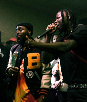 Nigerian musician, Davido and Ghana's Stonebwoy on stage