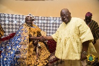 President Akufo-Addo in his colourful yellow smock with Yaa-Naa Abukari Mahama II