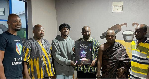 TGMAs Unsung Artiste of the Year, Yaw Darling in a photo with some Assin Fosu chiefs and elders