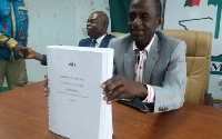 NDC's General Secretary, Johnson Asiedu Nketia receiving the Kwest Botchwey report