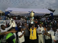 The winners displaying their trophies