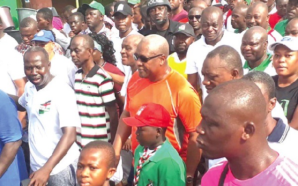Former President Mahama, some NDC executives with some supporters during one of their unity walks