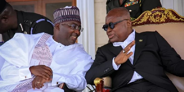 Dr. Bawumia seated with President Akufo-Addo