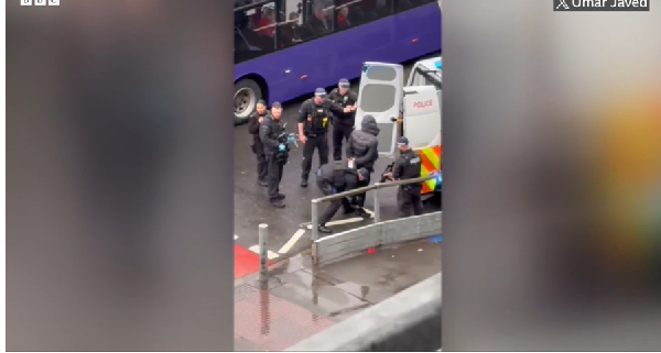 Sreenshot from a video that showed an arrest outside Heathrow Airport