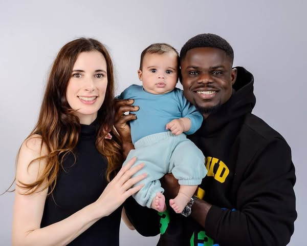 Freezy MacBones with his wife Helen Defrance and baby
