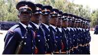 Police recruits march during a pass out parade at Kiganjo Training College in Nyeri County, Kenya