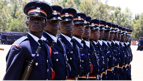 Police recruits march during a pass out parade at Kiganjo Training College in Nyeri County, Kenya