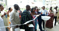 Esther Dzifa Ofori  and Jesus Mba Bela Abaha cut the tape to open the ISGC restaurant