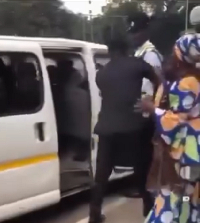 A screenshot of the officers engaged in the physical confrontation