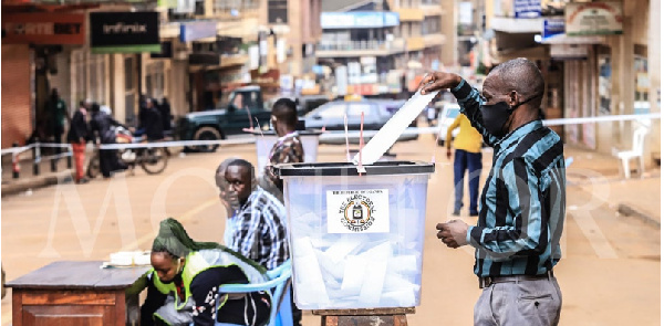 A man casts his vote during the 2016 General Election in Kampala