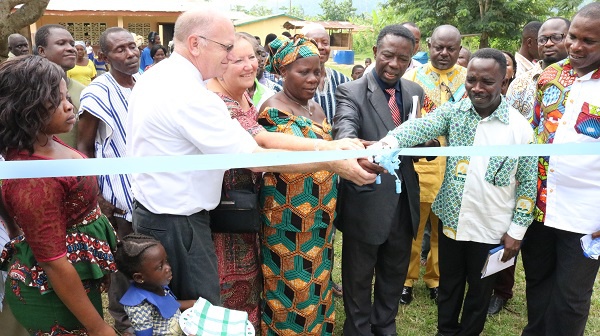 Officials of LDS Charities and Bosuso SDA School opening an ultra-modern toilet facility