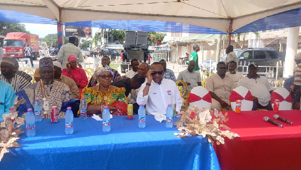 Jerry Ahmed speaking sited among other dignitaries during the inauguration