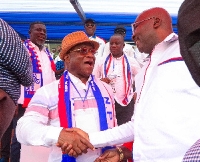 Osei Kyei-Mensah-Bonsu (in hat) in a handshake with Dr. Bawumia