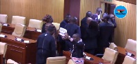 Some Minority MPs holding placards with the inscription 'bloody widow'