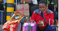 Passengers were pictured queuing outside the airport on Wednesday morning