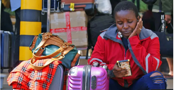 Passengers were pictured queuing outside the airport on Wednesday morning