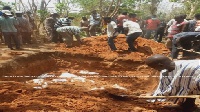 Bodies of burnt victims of the Kintampo accident being buried