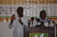 Prince Charles Sackifio, (right) delivering a speech at a function