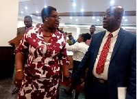 Mami Dufie Ofori on the left interacting with a Jones Ofori