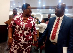 Mami Dufie Ofori on the left interacting with a Jones Ofori