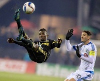 Ghana defender Harrison Afful in action