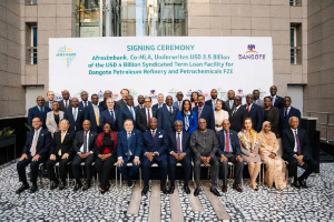 Aliko Dangote with Afreximbank officials at a signing ceremony in Cairo