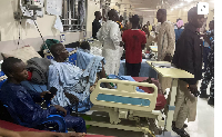 People injured in an explosion during evening prayers at a mosque receive treatment at Borno State S