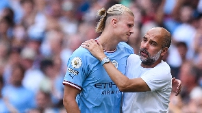 Manchester City coach, Pep Guardiola and striker Erling Haaland