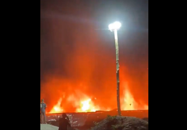 The blaze quickly spread and engulfed the area