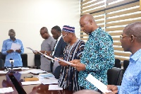 The nine-member Audit Committee of the Petroleum Commission being sworn into office