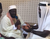 Imam of Bepoase praying for Okatakyie Afrifa-Mensah