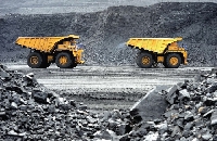 Mining trucks at a site | File photo