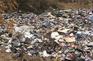 A refuse dump along the banks of the Densu River