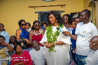 NAPO's wife, Alma Naa Jama Opoku Prempeh (in white with herbs around her neck)