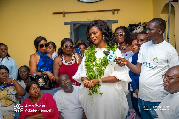 NAPO's wife, Alma Naa Jama Opoku Prempeh (in white with herbs around her neck)