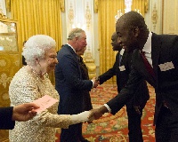 Mr Poku Osei (R) exchanging pleasantness with Queen Elizabeth II