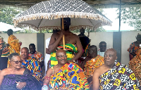 Daasebre Akuamoah Boateng III, middle, flanked by the Queen mother of KTC, and another sub-chief