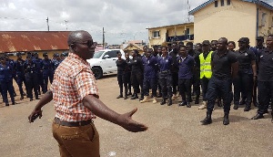 KMA Boss Osei Assibey speaking to personnel of the security agencies